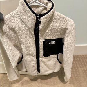 The North Face jacket* offers welcome